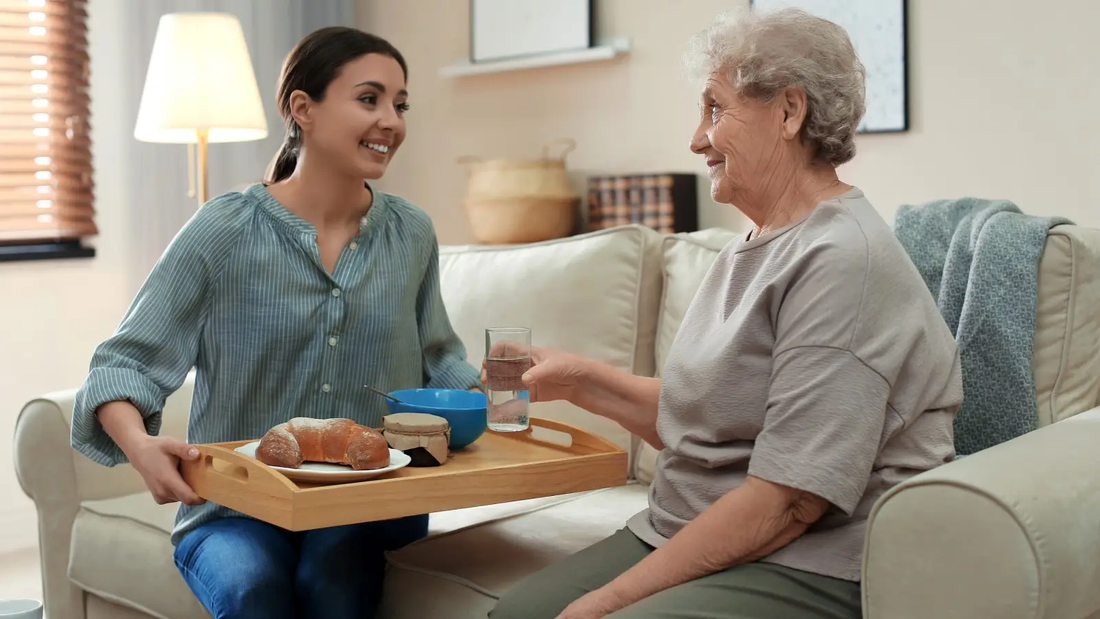 http://Young-Woman-Serving-Dinner